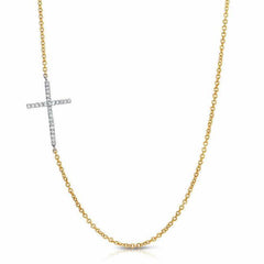 sideways cross necklace with diamonds in yellow gold