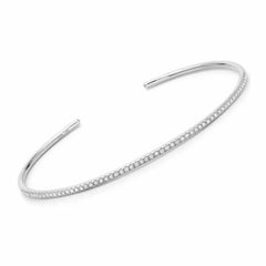 Thin 14k gold cuff with diamonds in white gold