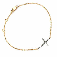 sideways cross bracelet in yellow gold and black rhodium with diamonds