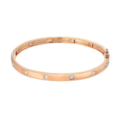 14k rose gold high polish bangle with diamonds