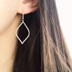 open marquise earrings on ear