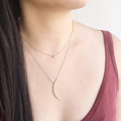 star pave choker layered wiht other necklaces