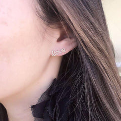 love script post earring on ear