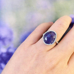 tanzanite ring on finger