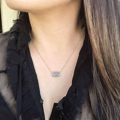 one of a kind diamond slice necklace on neck