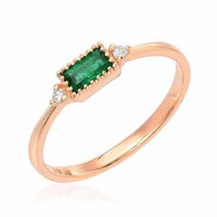 emerald baguette ring in rose gold