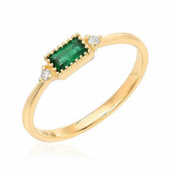 emerald baguette ring in yellow gold
