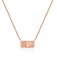 personalized necklace with single diamond and diamond initials in rose gold