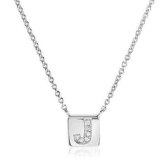 petite initial tag necklace with diamonds in white gold