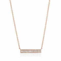 Channel set baguette diamond necklace in rose gold