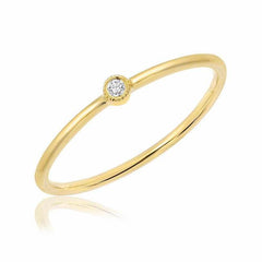 Single Petite Bezel Set Diamond Band in yellow gold