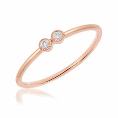 double petite bezel set diamond band in rose gold