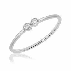 double petite bezel set diamond band in white gold