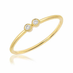 double petite bezel set diamond band in yellow gold