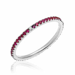 Ruby eternity band with compass point diamonds in white gold
