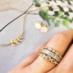 Heirloom graduated 5 rose cut ring stacked with other rings