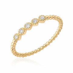 beaded band with 5 bezel set diamonds in yellow gold
