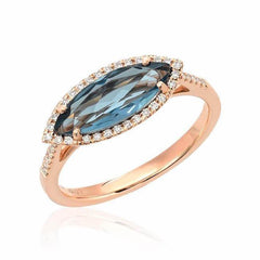 marquise ring in rose gold with london blue topaz
