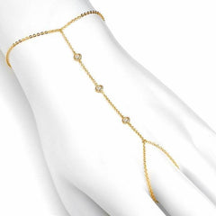 three diamond hand chain bracelet with diamonds in yellow gold