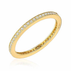 pave eternity band with milgrain border in yellow gold