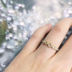 heirloom graduated rose cut five diamond band on hand