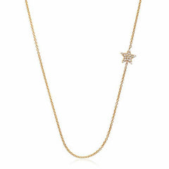 sideways star necklace with diamonds in yellow gold